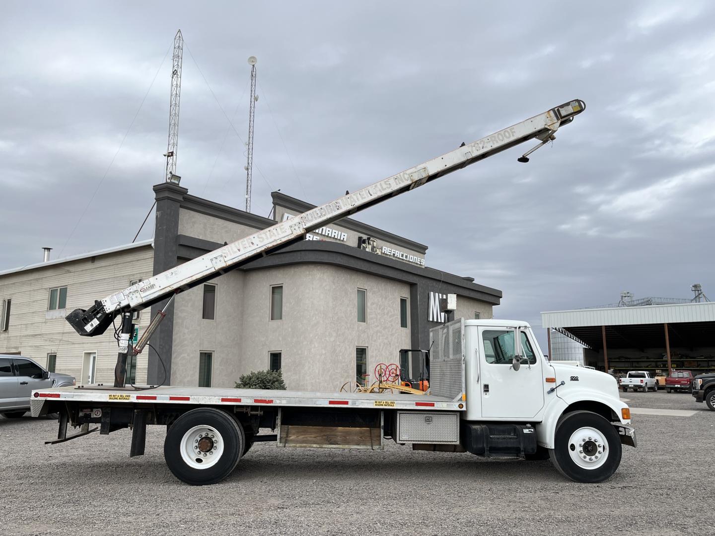 ./imagenes/INVOICE/2019/17377/CAMION INTERNATIONAL 4700 4X2 CON BANDA TRANSPORTADORA (1).JPG